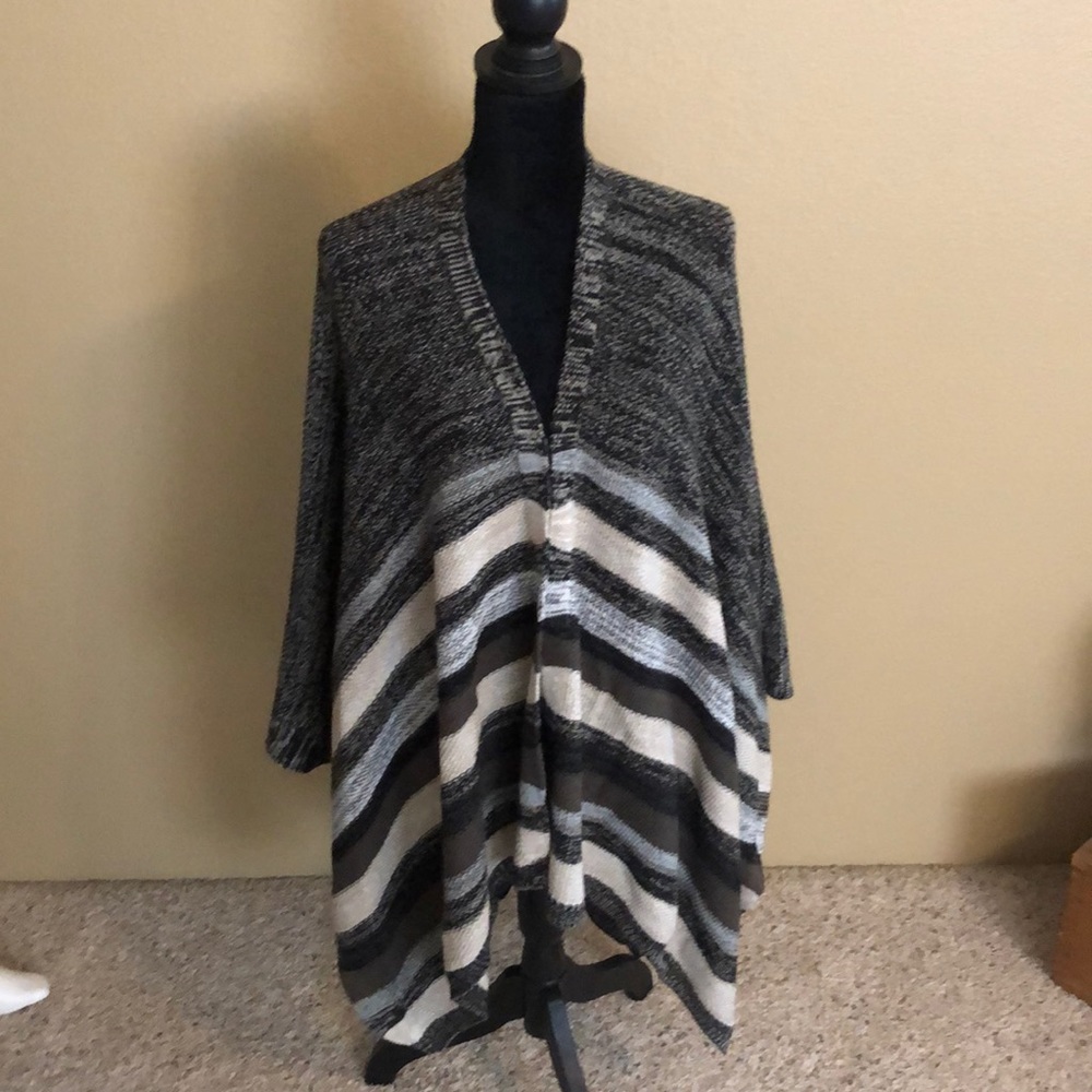 Gift never worn. Too big